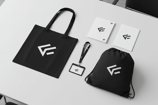 Black tote bag and drawstring bag with a printed logo, ready for an autumn event