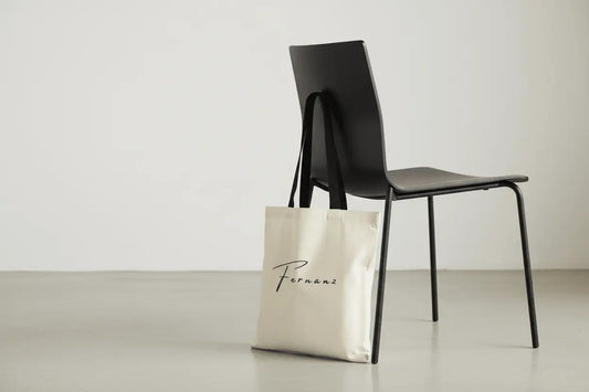fernanz tygpåse med färgade handtag och tryck