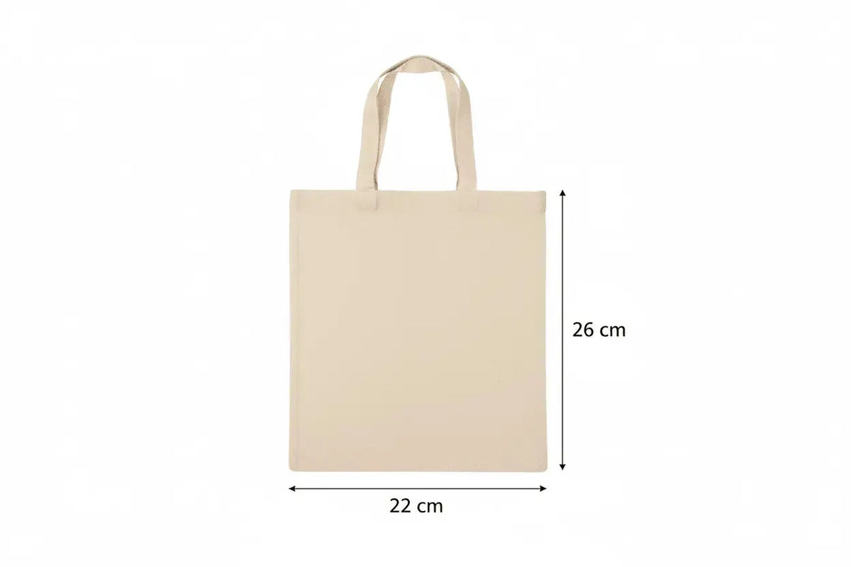 Naturvit liten tygkasse i bomull med måtten 22 cm bred och 26 cm hög